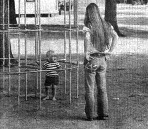 adoption in the 1960s | single mother with child on playground 