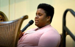 Virginia's General Assembly | Foster Care Advocacy Day | Foster care young woman with a microphone speaking
