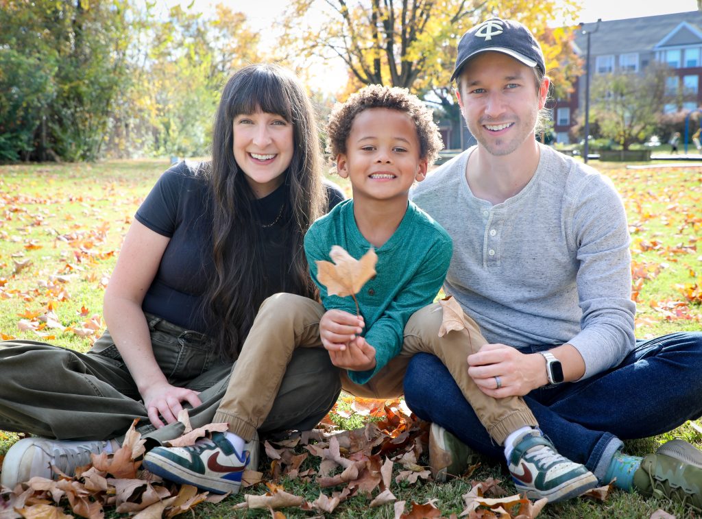 Alex and Liz, adoptive parents, with their adopted son